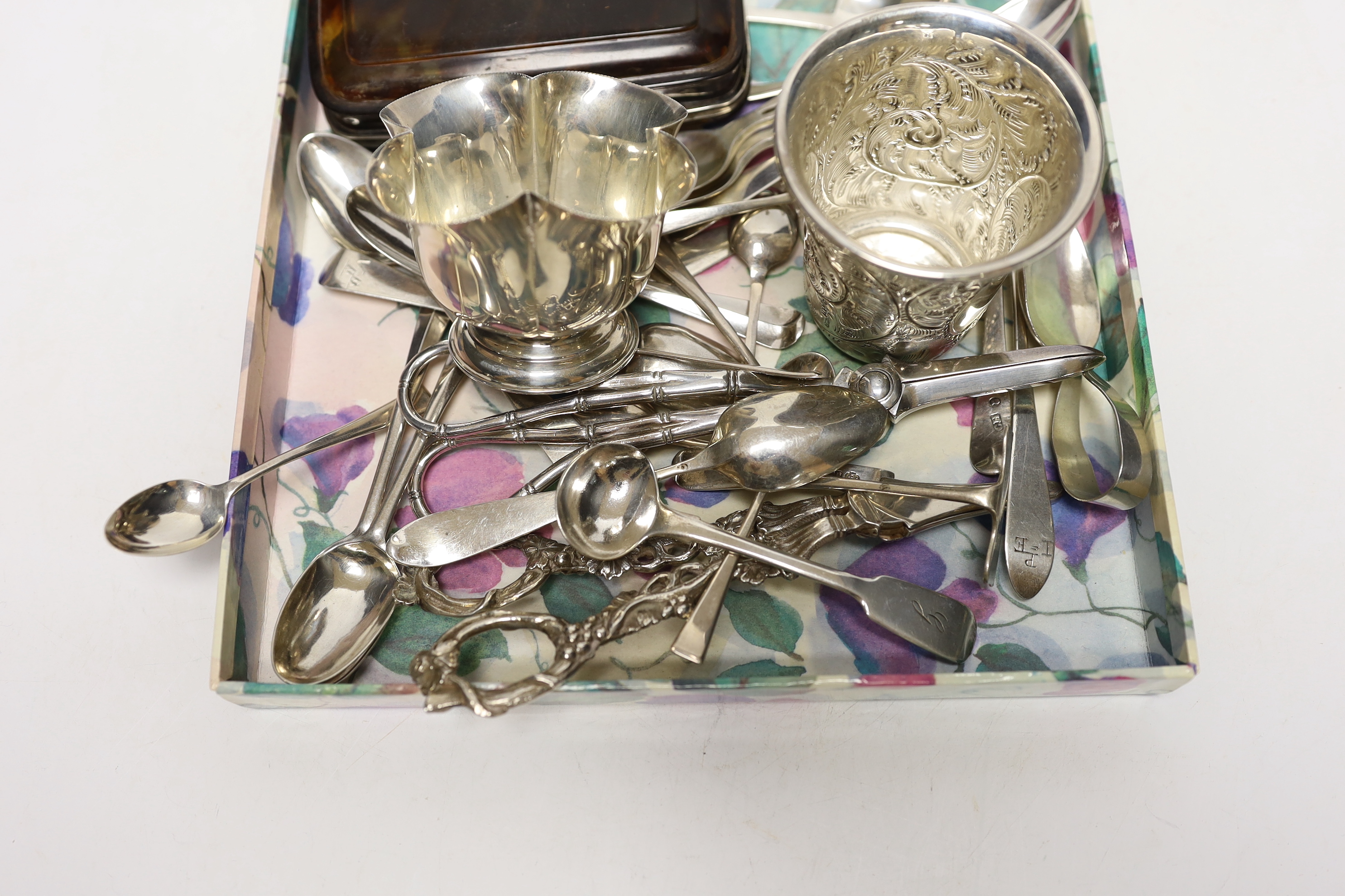 A modern pair of silver vineous grape shears, London, 1977, 16.4cm, one other earlier pair, a sterling beaker, silver bowl and a quantity of assorted silver spoons including 18th century Irish and a pair of preserve spoo